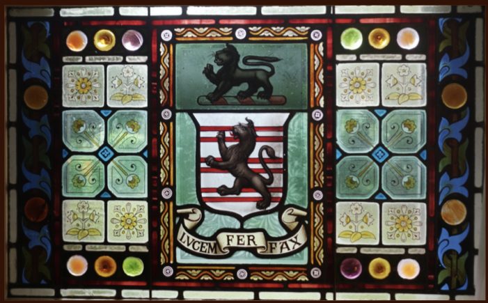 Stained glass window of Fairfax Family Coat of Arms at Retford Park (motto Fairfax Bring Light!)
