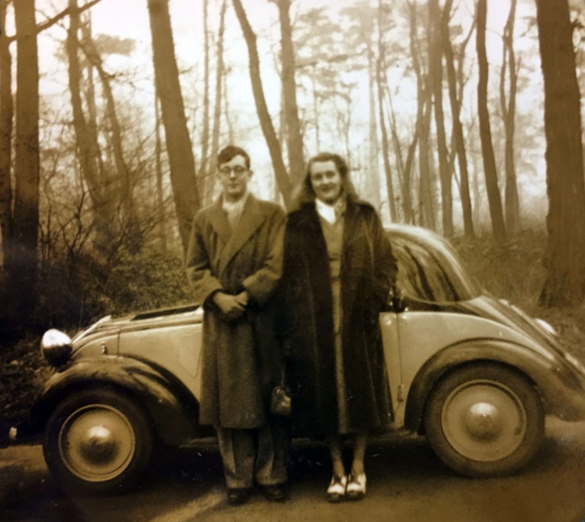 James and Caroline in their Citroën 2CV, in the Bois de Boulogne, Paris, ca 1949